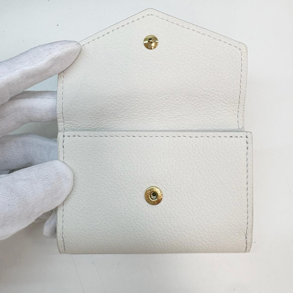 Louis Vuitton Portefeuille Lock Mini Taurillon Leather Blanc Trifold Wallet — view 4