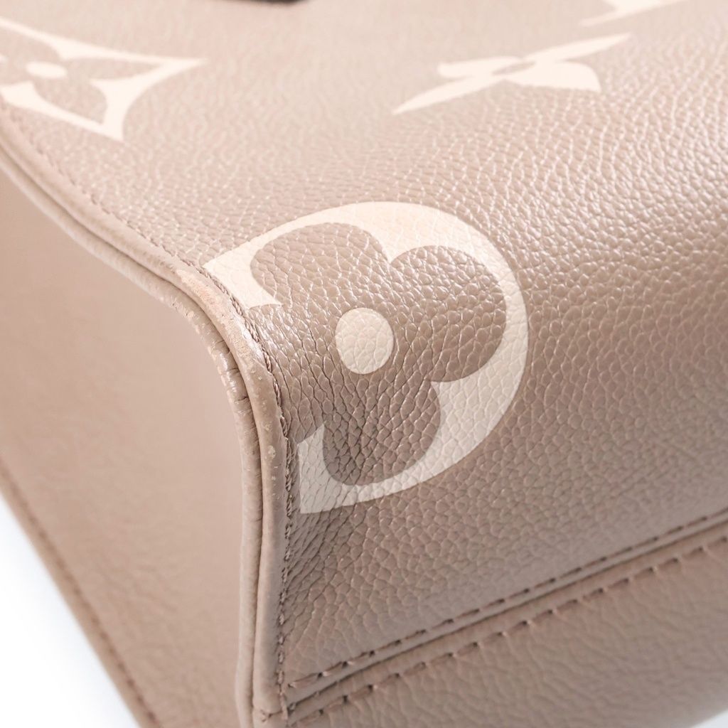 Louis Vuitton Monogram Giant Empreinte On The Go PM Tourterelle Cream 2-Way — view 5