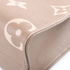 Louis Vuitton Monogram Giant Empreinte On The Go PM Tourterelle Cream 2-Way — view 6