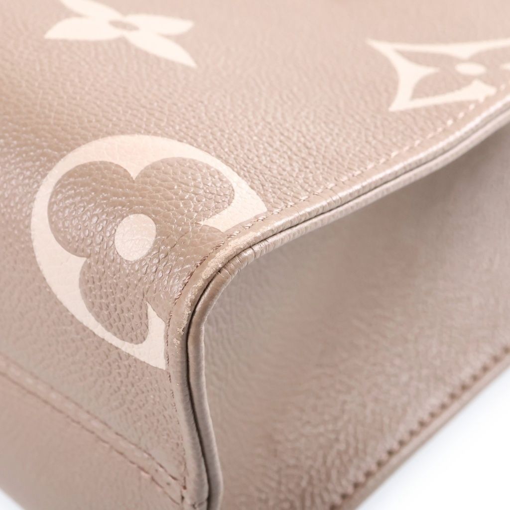 Louis Vuitton Monogram Giant Empreinte On The Go PM Tourterelle Cream 2-Way — view 6