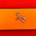 Hermes Vintage Tassel Motif Scarf Ring Silver
