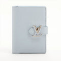 Louis Vuitton Taurillon LV Vertical Wallet with Compact Leather Bifold