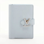 Louis Vuitton Taurillon LV Vertical Wallet with Compact Leather Bifold