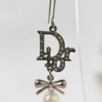 Dior Logo Ribbon Pearl Swing Earrings Plated Silver Ivory Clear Vintage — view 5