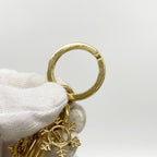 Louis Vuitton Key Holder Charm Vivienne Ice Skating Gold — view 3