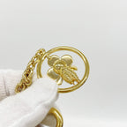 Louis Vuitton Key Holder Charm Vivienne Ice Skating Gold — view 5