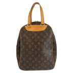 Louis Vuitton Monogram Excursion Handbag Brown Gold Leather
