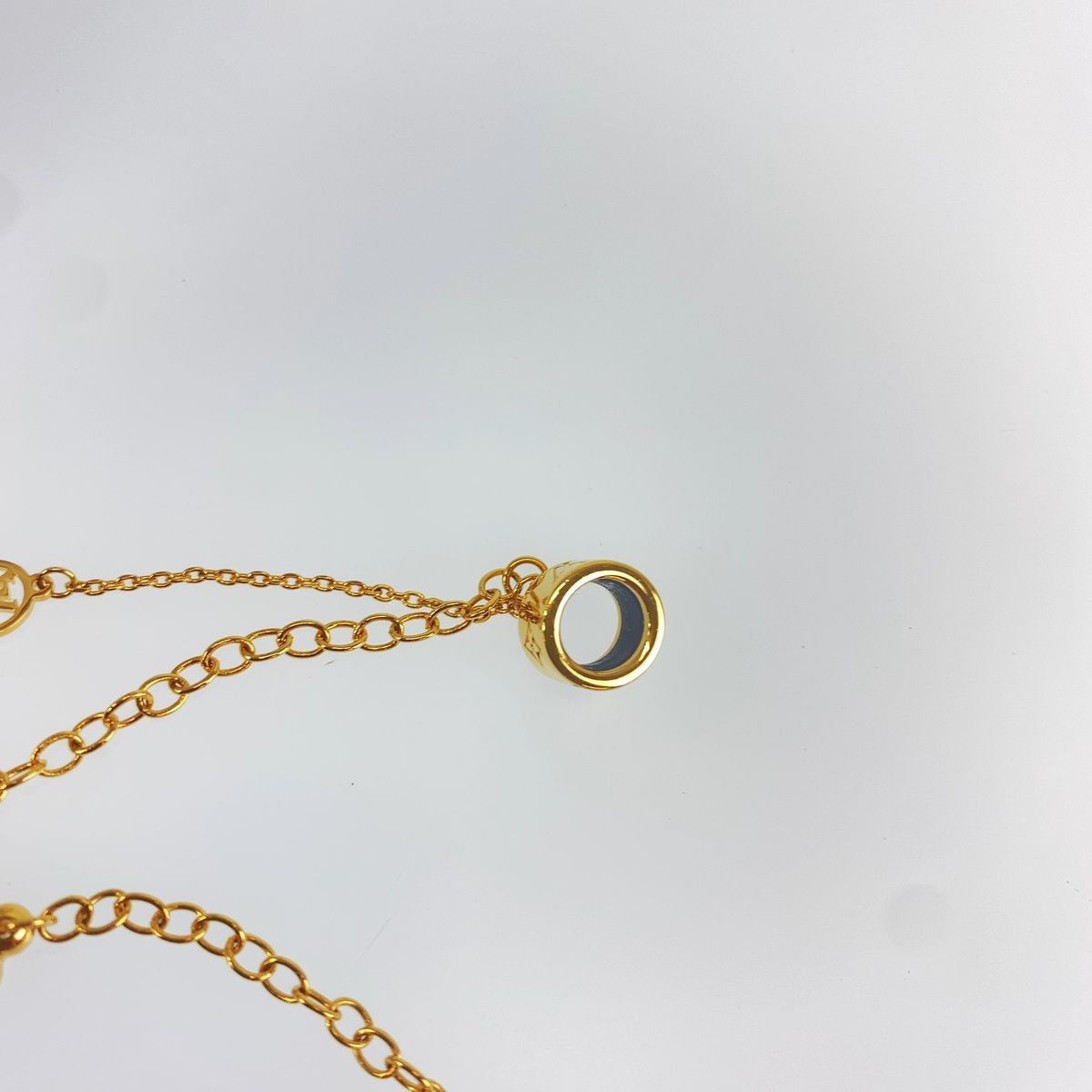 Louis Vuitton LV Flower Gold Metal Earphones Charm Airpods Keychain — view 4