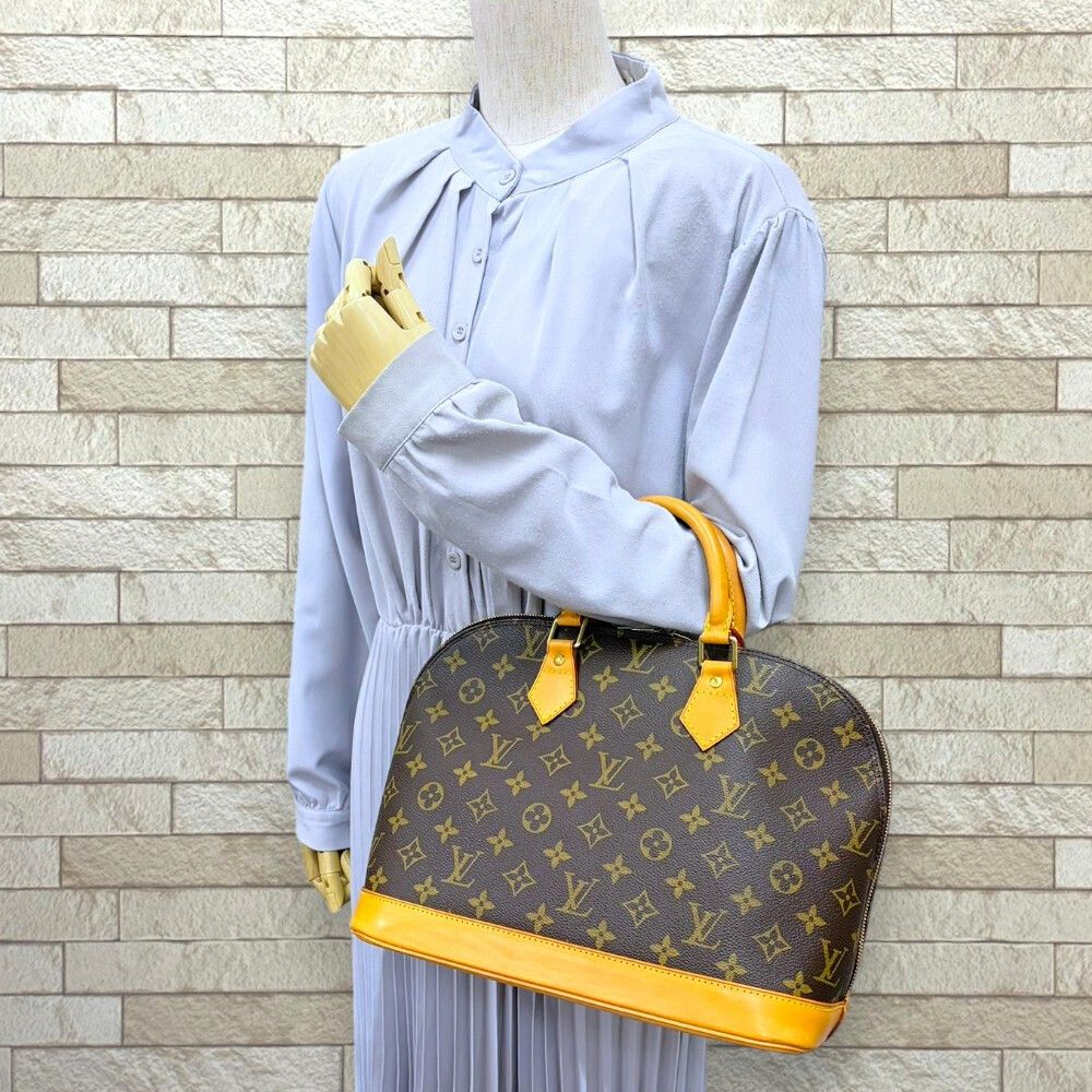 Louis Vuitton Alma PM Monogram Handbag Canvas Brown — view 2