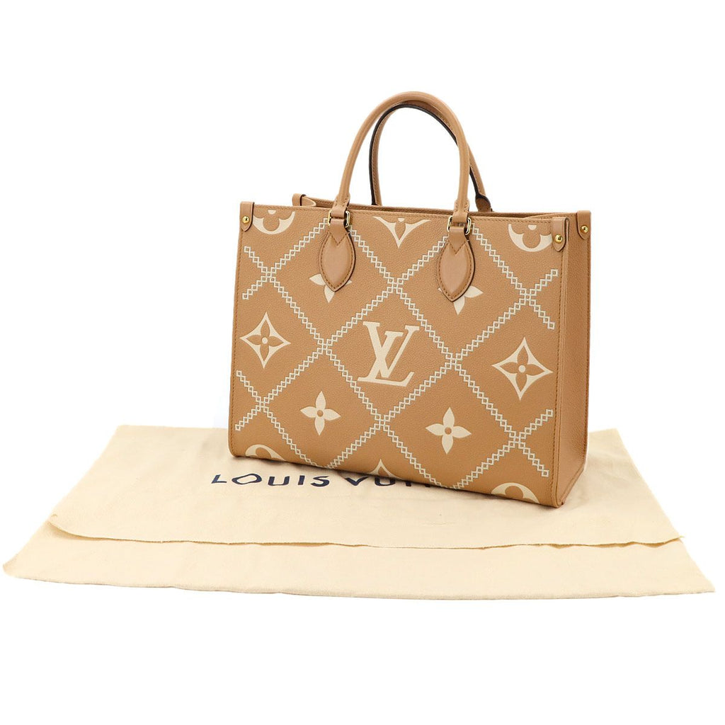 Louis Vuitton Bicolor Monogram Empreinte On The Go MM 2-Way Tote Shoulder Bag — view 2