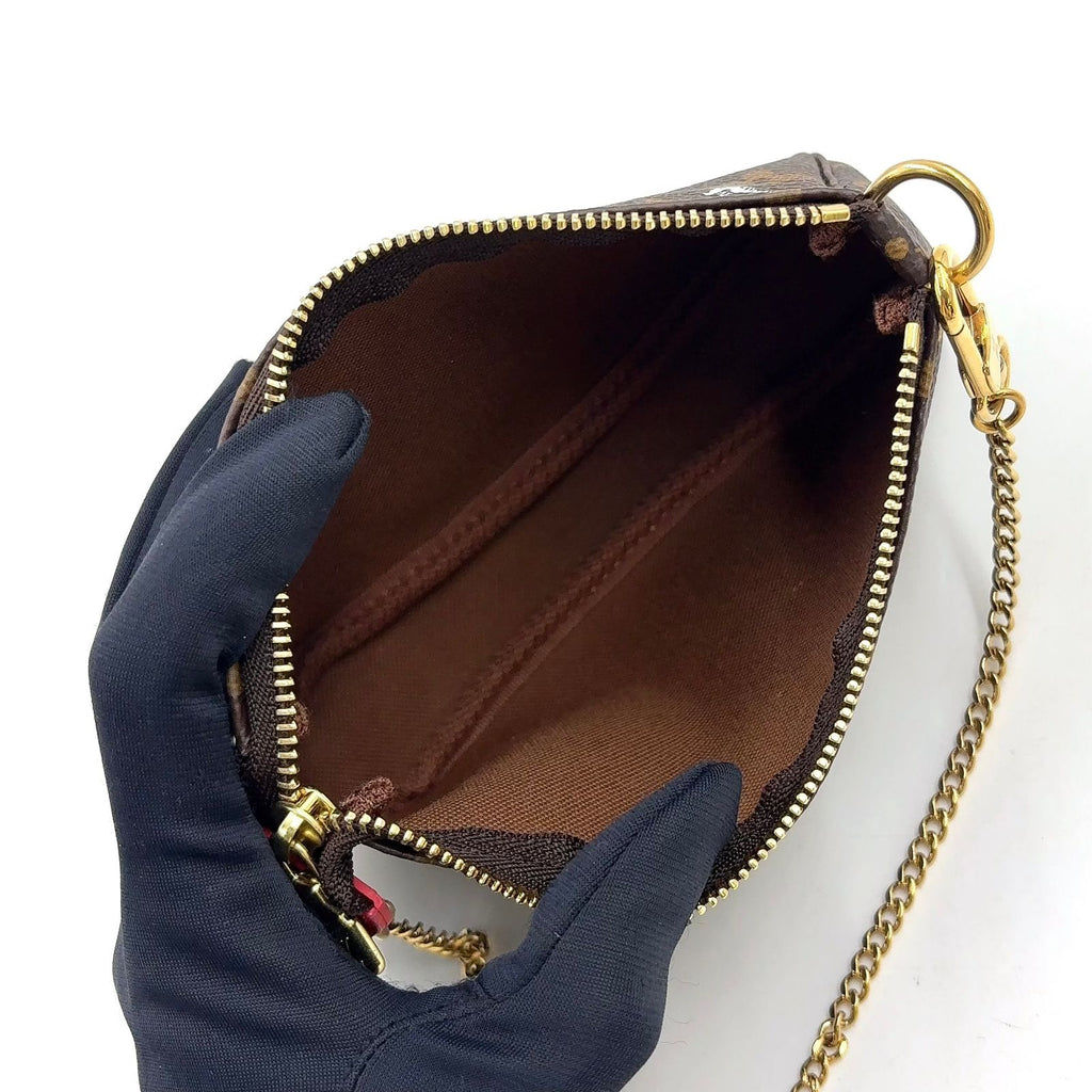 Louis Vuitton Mini Pochette Accessoires Illustre Brown Handbag Gold — view 3