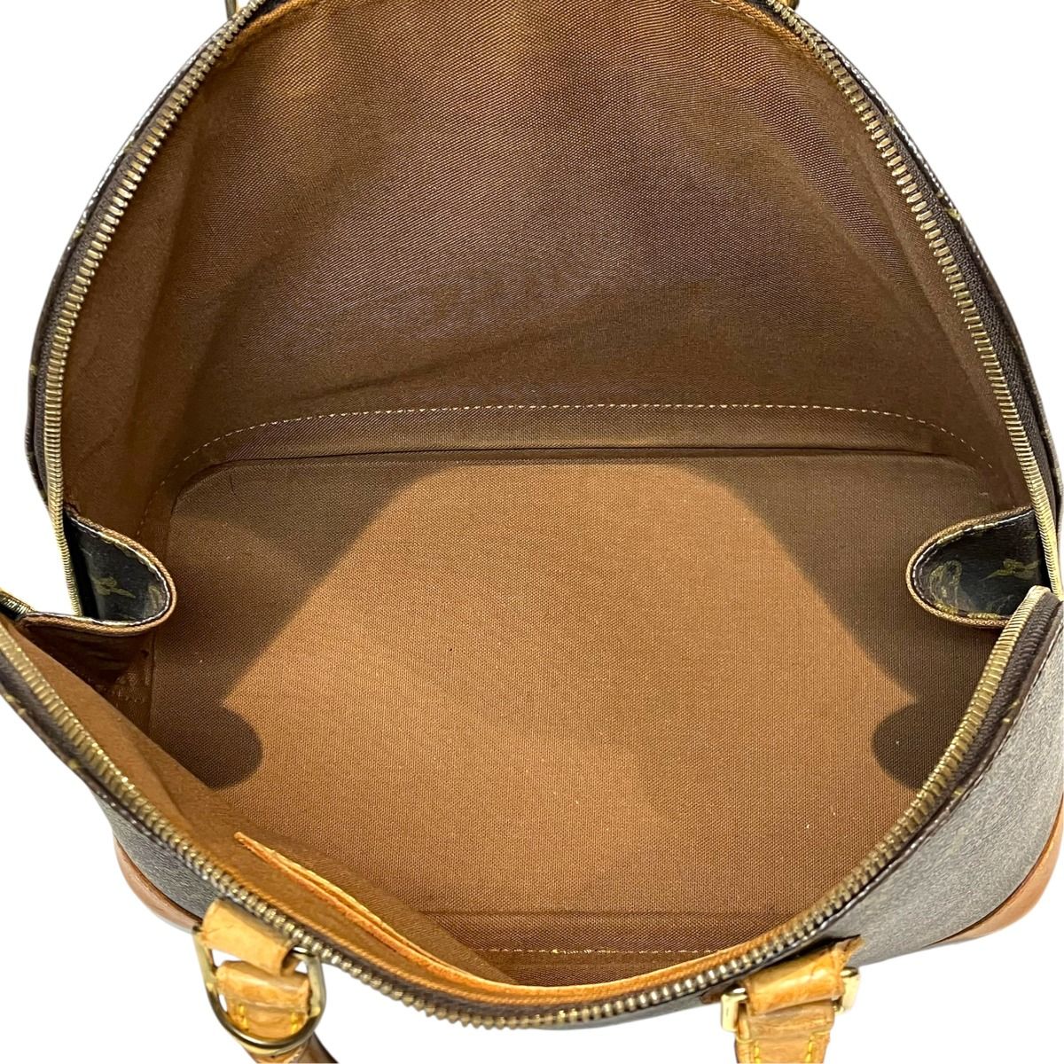 Louis Vuitton Alma Monogram Handbag Canvas — view 8