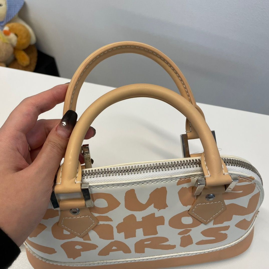 Louis Vuitton Alma Oriental Handbag — view 6