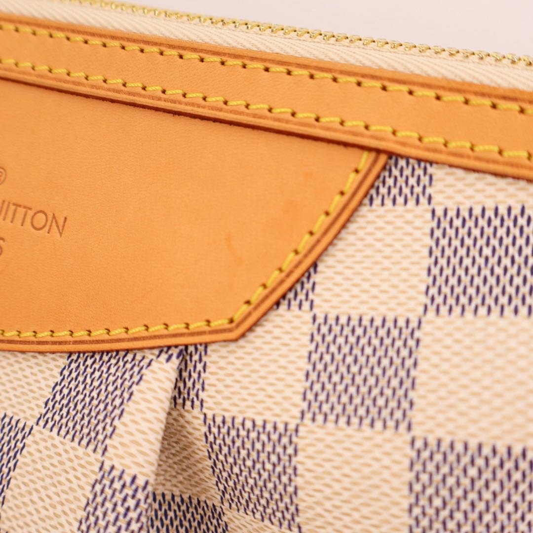 Louis Vuitton Syracuse PM Shoulder Bag