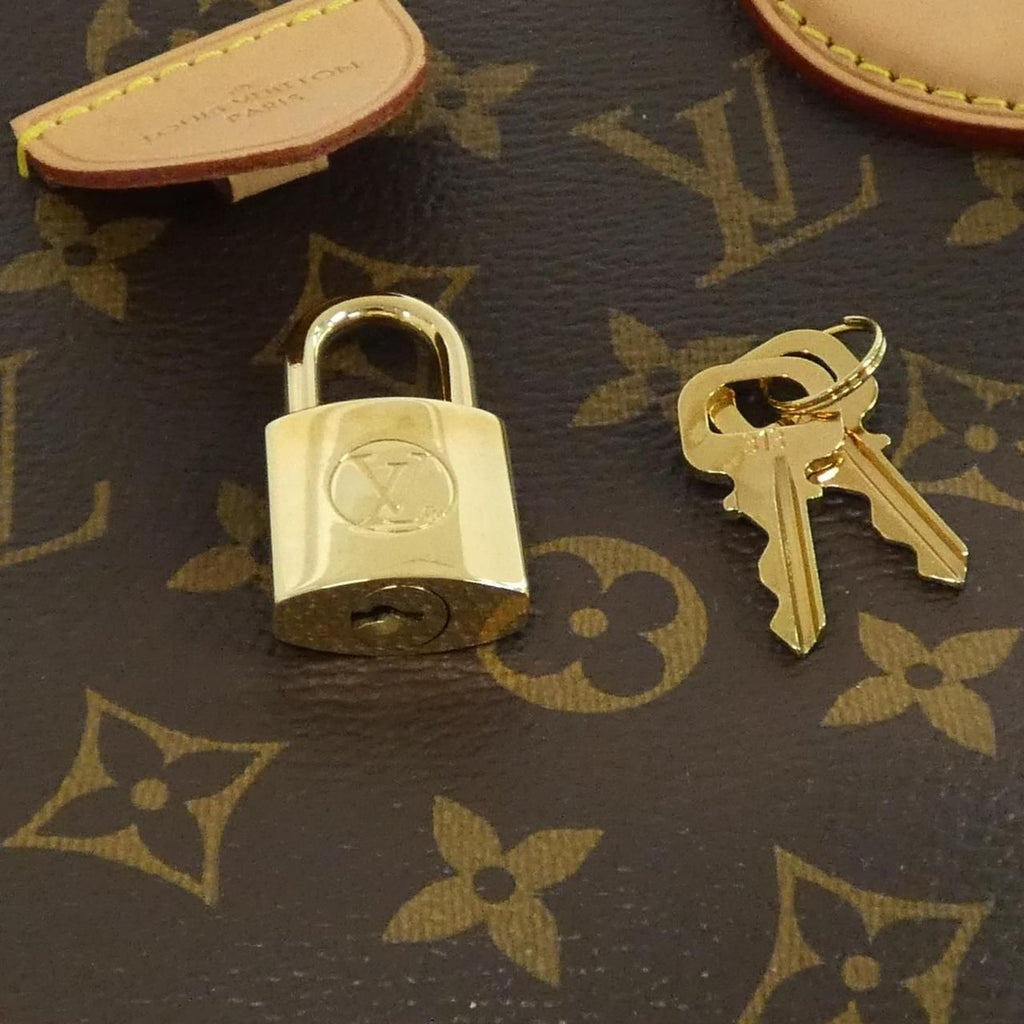 Louis Vuitton Monogram Rivoli MM Bag — view 4