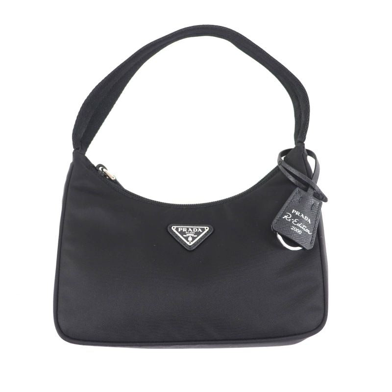 Prada 1 Ne515 re-Edition 2000 re-Nylon Mini Bag with Triangle Plate Charm