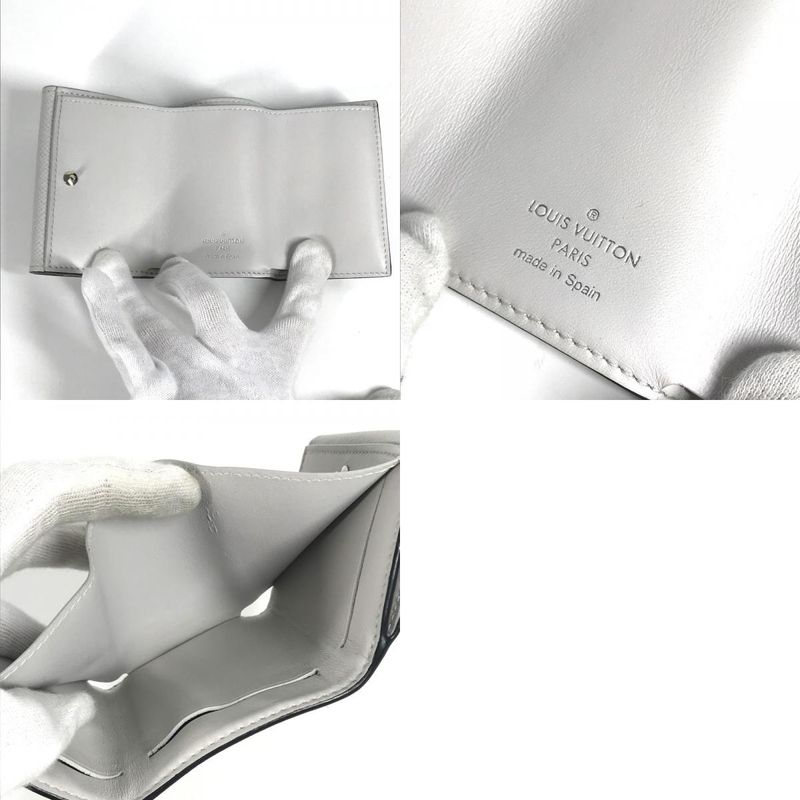 Louis Vuitton Trifold Wallet Discovery Compact Taiga Leather — view 9