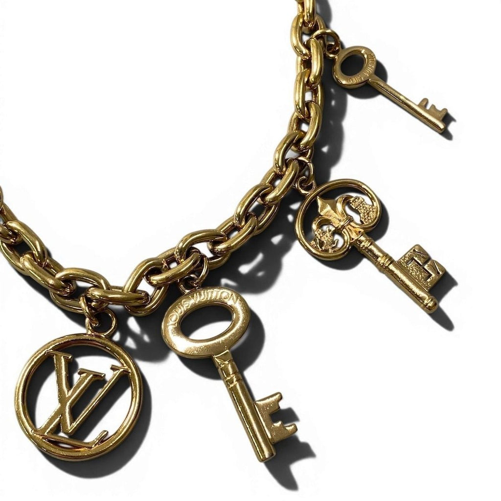 Louis Vuitton Bijou Sac Key Chain Charm Gold Metal Key Holder — view 3