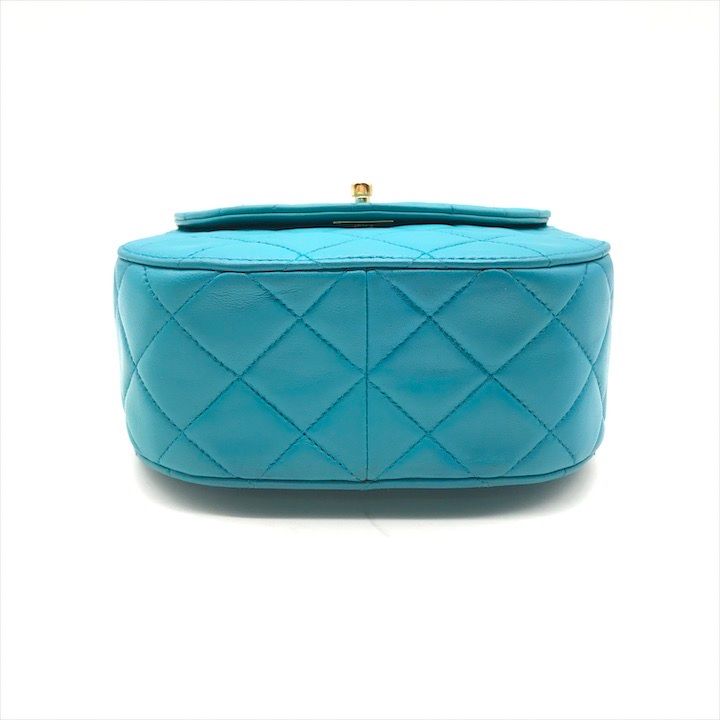Chanel CC Logo Turnlock Quilted Lambskin Mini Hand Vanity Bag Blue — view 3