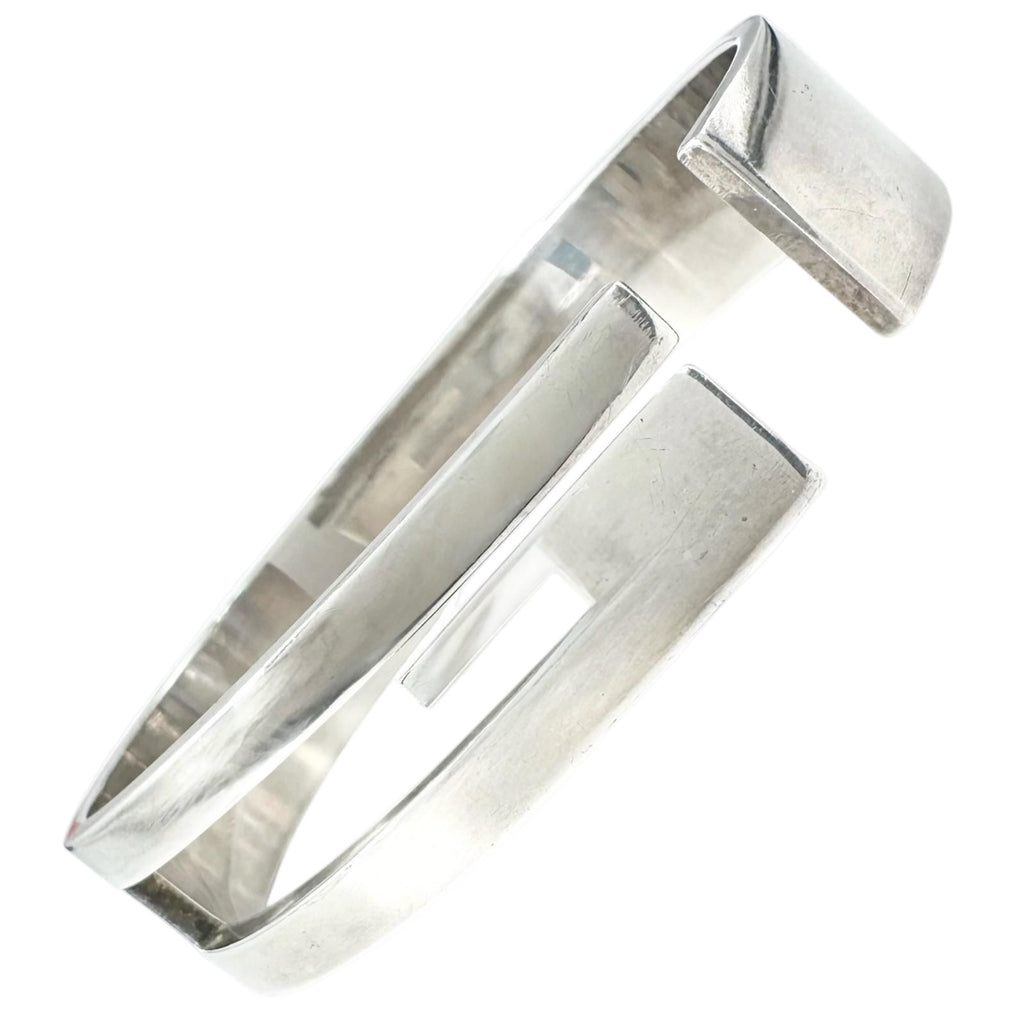 Gucci Cutout Logo Silver Bangle Bracelet