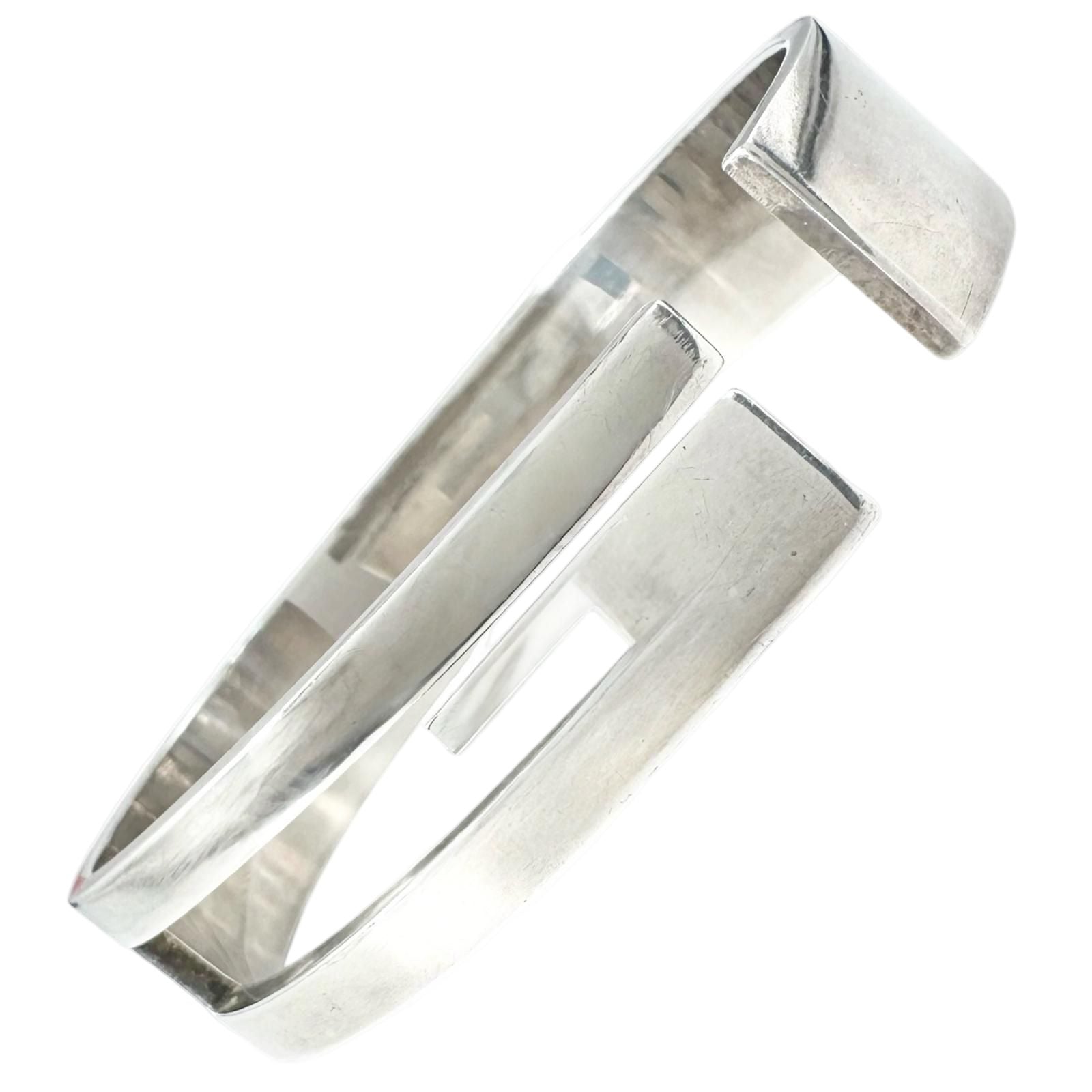 Gucci Cutout Logo Silver Bangle Bracelet