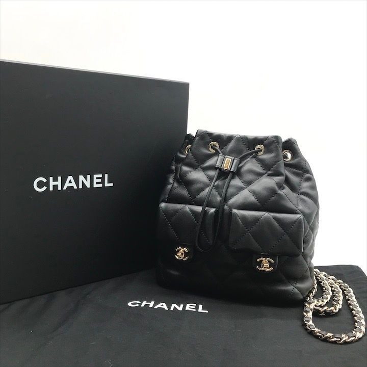 Chanel Quilted Lambskin CC Logo Drawstring Chain Backpack Pack Black