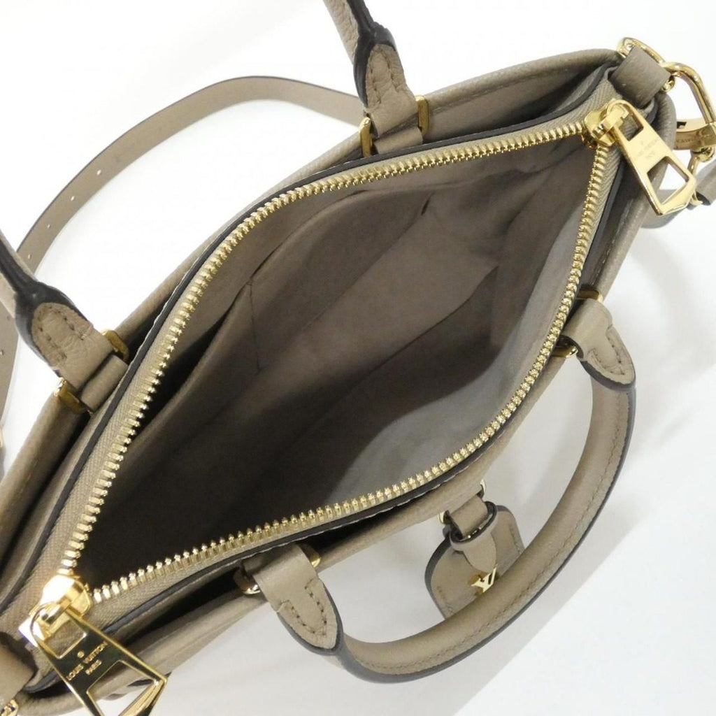 Louis Vuitton Bicolor Monogram Empreinte Trianon PM Bag — view 8