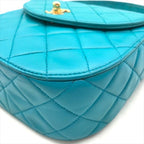 Chanel CC Logo Turnlock Quilted Lambskin Mini Hand Vanity Bag Blue — view 5