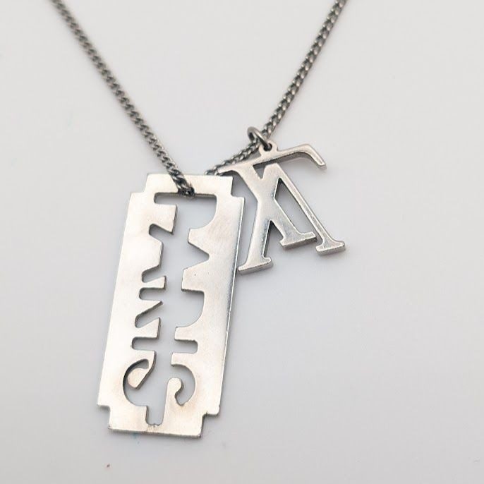 Louis Vuitton Collier Charm for Gentlemen Silver Lvlogo Paris Necklace