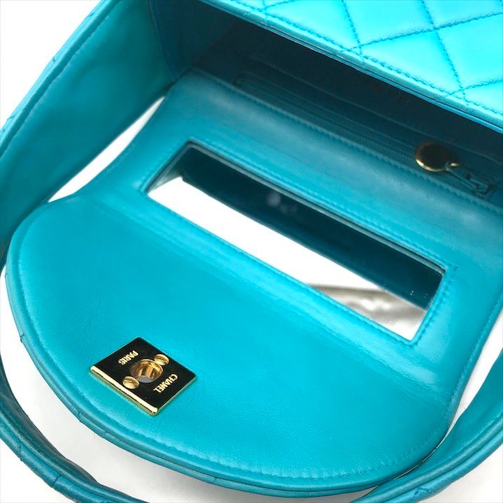 Chanel CC Logo Turnlock Quilted Lambskin Mini Hand Vanity Bag Blue — view 7