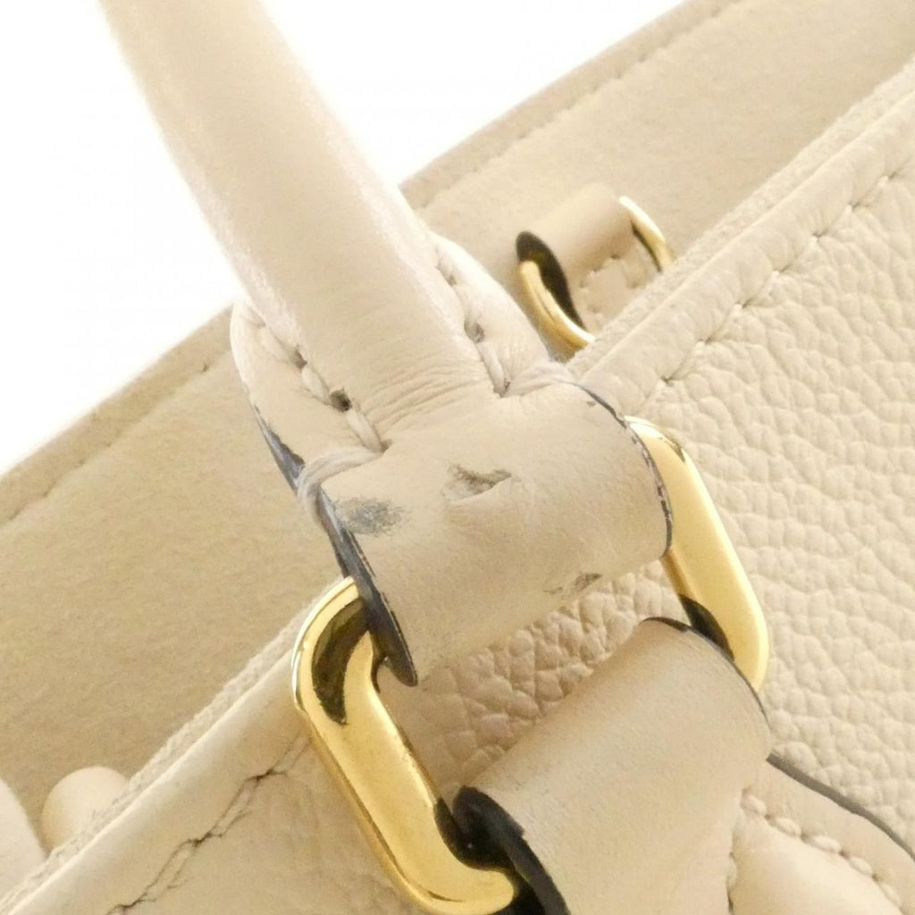 Louis Vuitton Monogram Empreinte On The Go PM Bag Creme — view 8