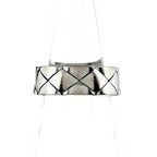 Chanel Quilted Ring Ation on the metal.