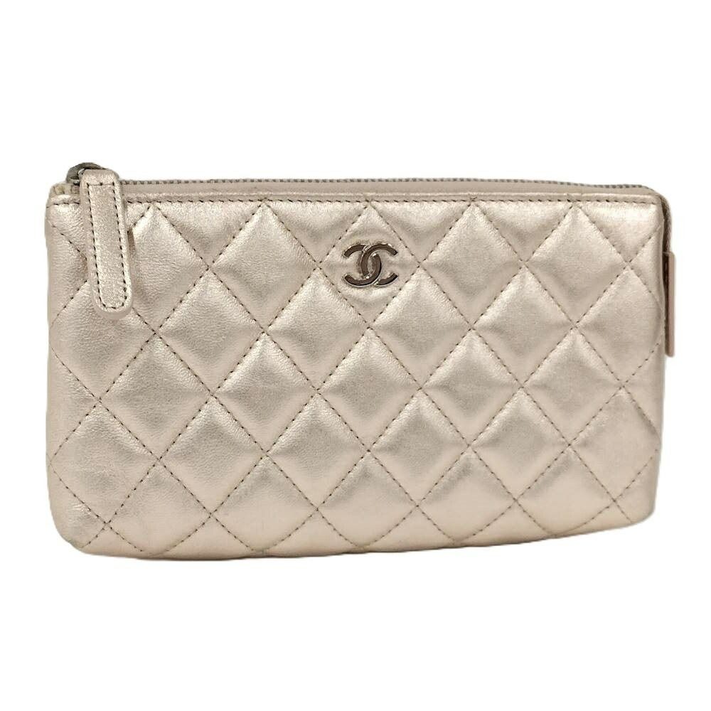 Chanel Quilted Cosmetic Pouch Metallic CC Logo Lambskin Pink