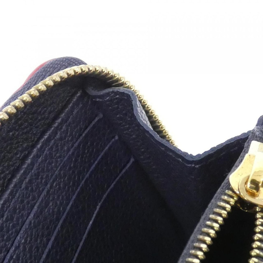 Louis Vuitton Monogram Empreinte Zippy Wallet — view 8