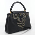Louis Vuitton Capucines PM Taurillon Handbag Leather