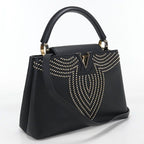Louis Vuitton Capucines PM Taurillon Handbag Leather