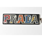 Prada Key Ring Holder Bag Charm Logo Patchwork Caracter Nero M Never — view 2