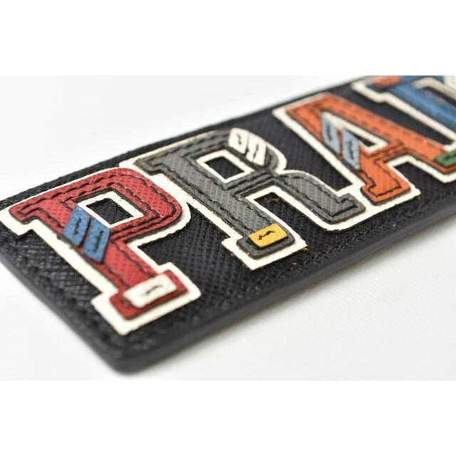 Prada Key Ring Holder Bag Charm Logo Patchwork Caracter Nero M Never — view 3
