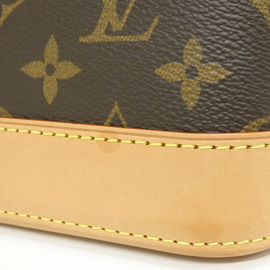Louis Vuitton Monogram Alma Backpack — view 5