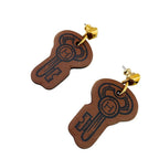 Hermes Curiosity Leather Earrings Brown