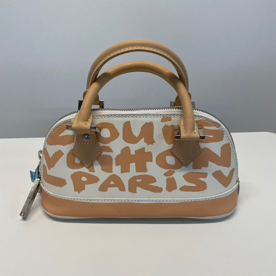Louis Vuitton Alma Oriental Handbag