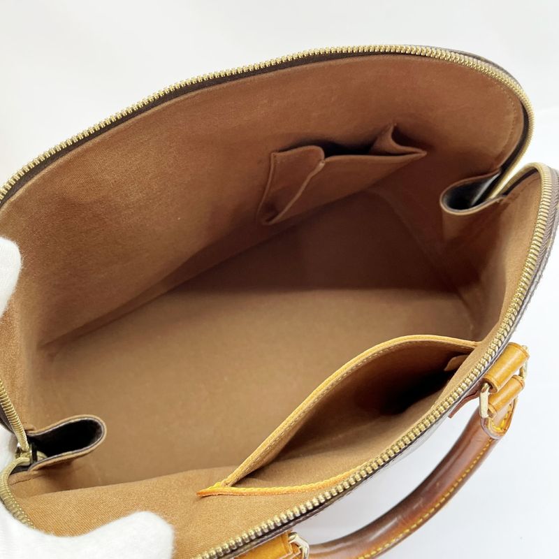 Louis Vuitton Monogram Alma Bag Handbag Brown — view 7