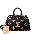Louis Vuitton Monogram Empreinte Speedy 25 Handbag