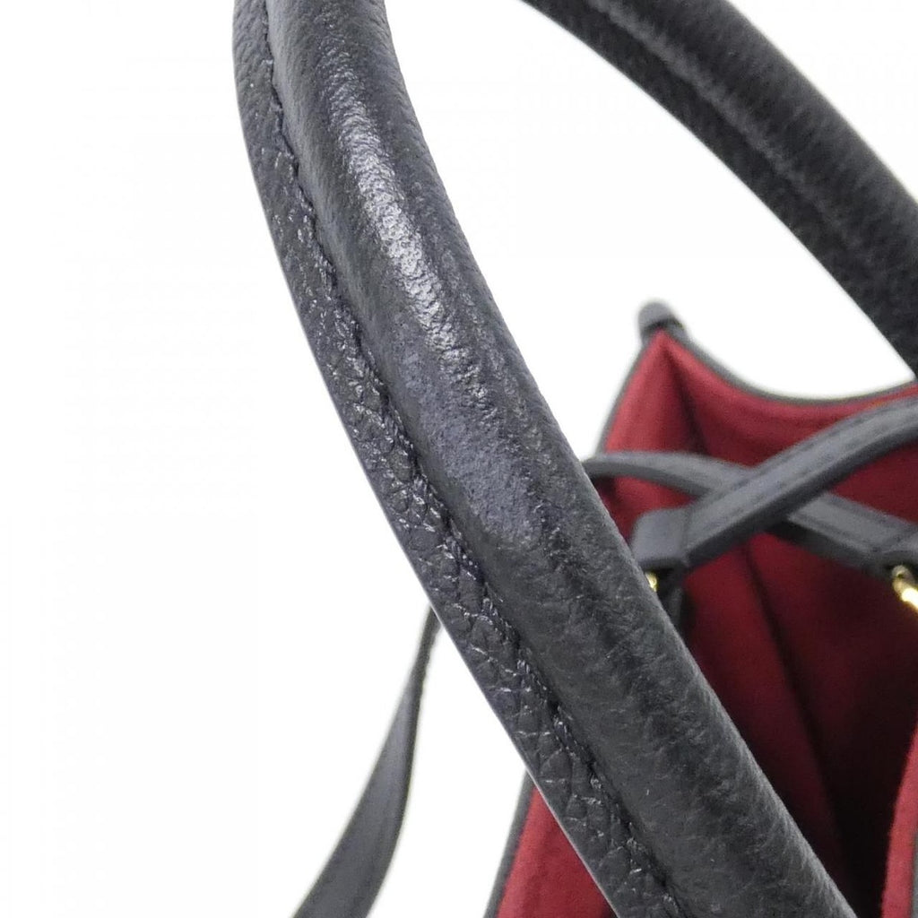 Louis Vuitton Bicolor Monogram Empreinte On The Go MM Bag — view 5