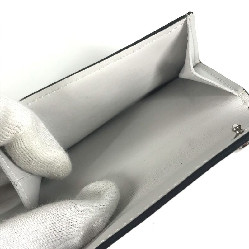 Louis Vuitton Trifold Wallet Discovery Compact Taiga Leather — view 7