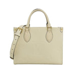 Louis Vuitton Monogram Empreinte On The Go PM Bag — view 2
