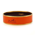 Hermes Bangle Emile GM Metal Cloisonne Orange Carved Gold Hardware Bracelet — view 2