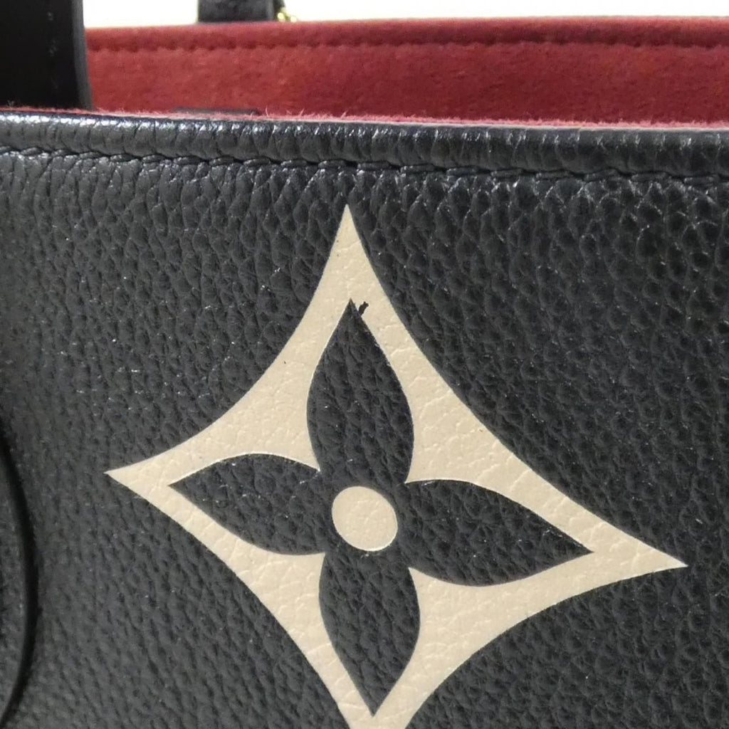 Louis Vuitton Bicolor Monogram Empreinte On The Go MM Bag — view 3