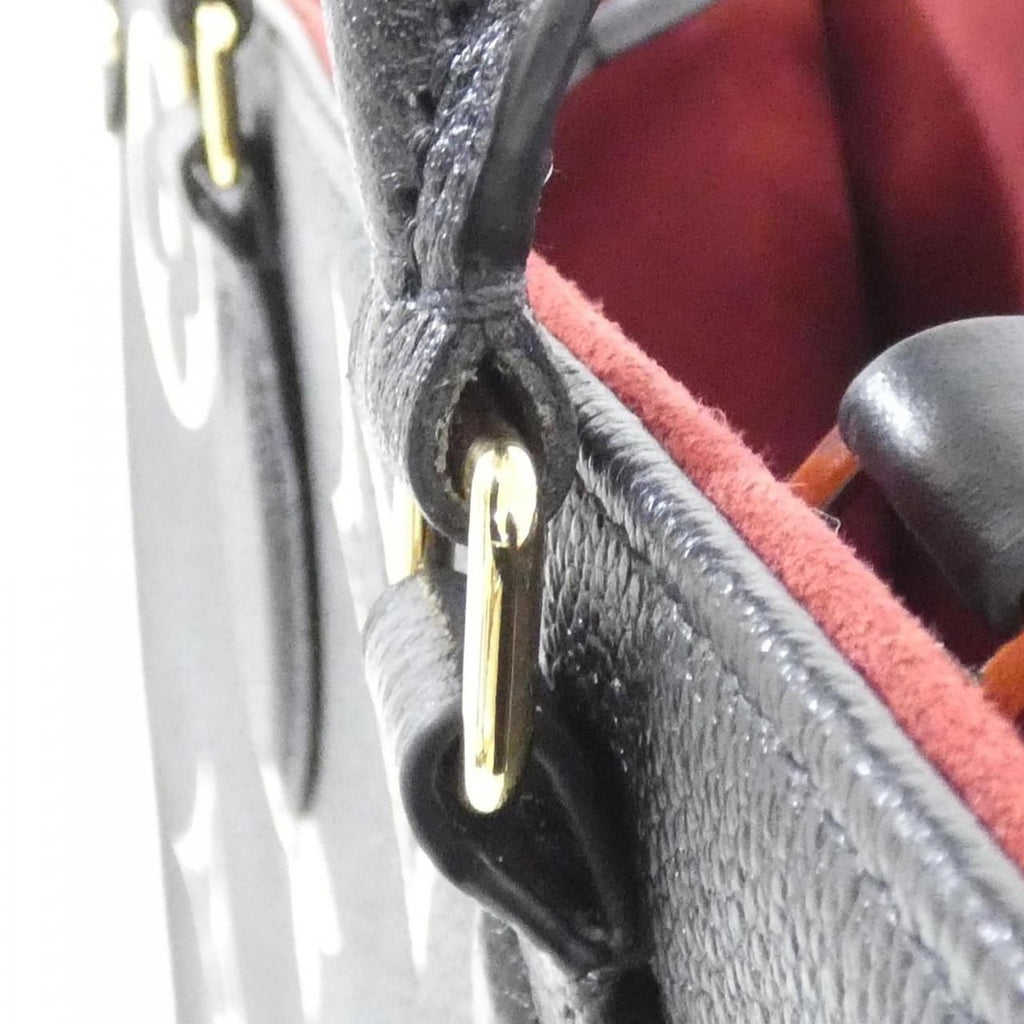 Louis Vuitton Bicolor Monogram Empreinte On The Go MM Bag — view 7
