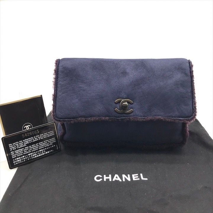 Chanel CC Logo Turnlock Mouton Hand Clutch Navy